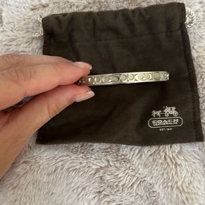Coach silver bangle. Dust bag included